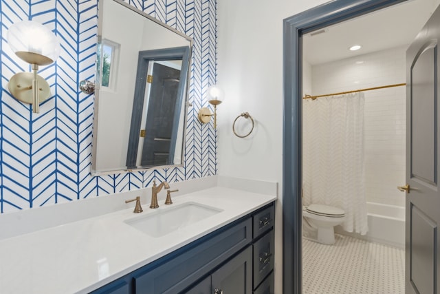 full bath with tile patterned floors, vanity, toilet, and shower / bathtub combination with curtain