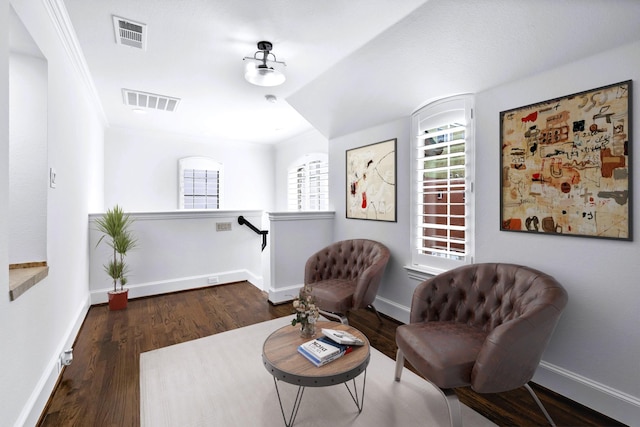 4929 Alcott St, Dallas, TX 75206 - living area featuring an upstairs landing, plenty of natural light, wood finished floors, baseboards, and ornamental molding