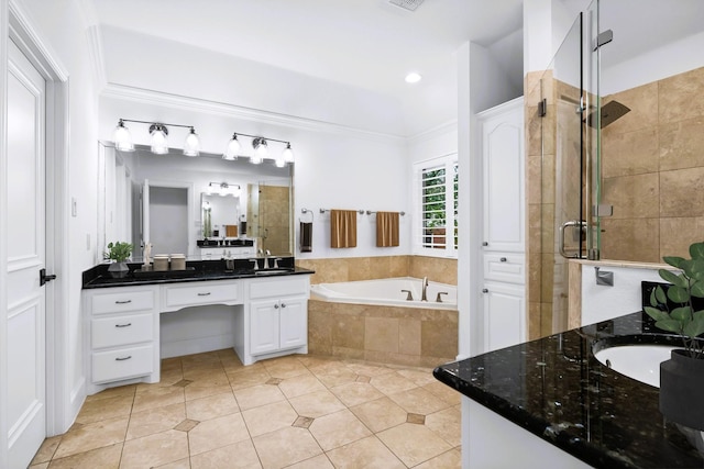 4929 Alcott St, Dallas, TX 75206 - full bath featuring tile patterned floors, a shower stall, vanity, a bath, and ornamental molding