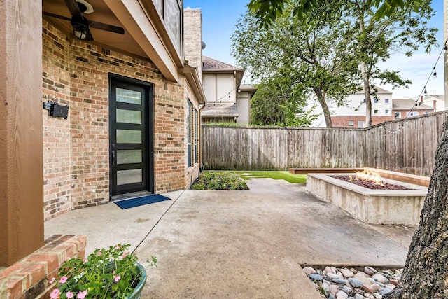 4929 Alcott St, Dallas, TX 75206 - view of patio with a fire pit and a fenced backyard
