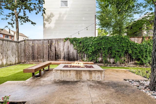 4929 Alcott St, Dallas, TX 75206 - view of patio with an outdoor fire pit and a fenced backyard