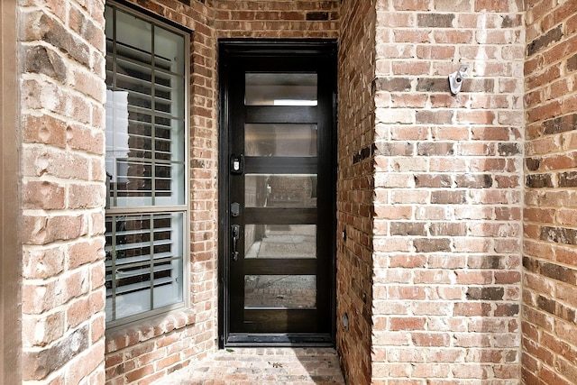 4929 Alcott St, Dallas, TX 75206 - view of exterior entry featuring brick siding