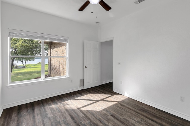 2858 Waters Edge, Quinlan, TX 75474 - spare room featuring visible vents, baseboards, wood finished floors, and ceiling fan