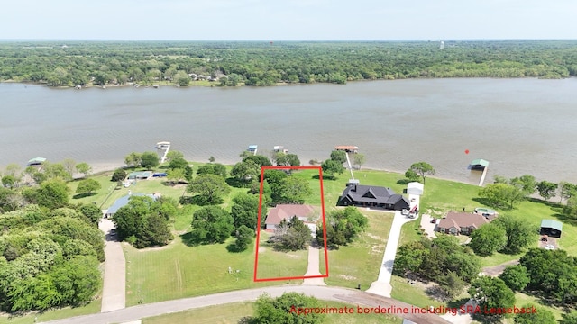 2858 Waters Edge, Quinlan, TX 75474 - aerial view with a view of trees and a water view