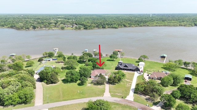 2858 Waters Edge, Quinlan, TX 75474 - bird's eye view featuring a forest view and a water view