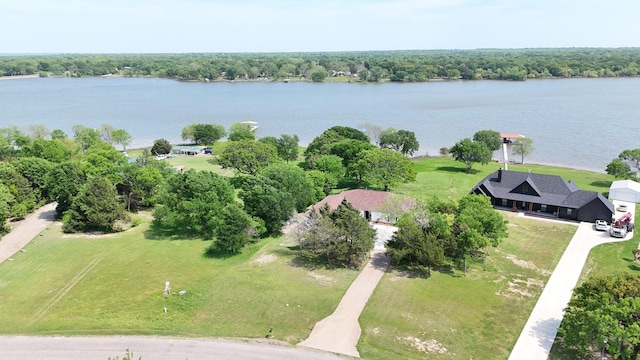2858 Waters Edge, Quinlan, TX 75474 - drone / aerial view featuring a water view