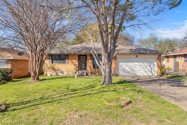 4331 Kolloch Dr, Dallas, TX 75216 - single story home with driveway, a front yard, a garage, and brick siding