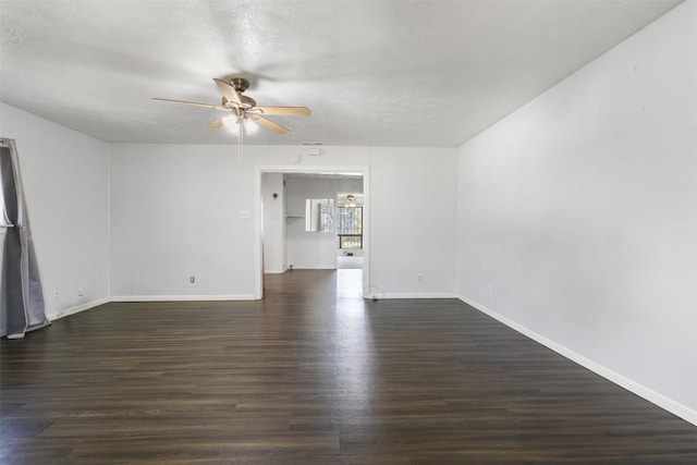 4331 Kolloch Dr, Dallas, TX 75216 - empty room with a textured ceiling, baseboards, wood finished floors, and a ceiling fan