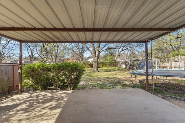 4331 Kolloch Dr, Dallas, TX 75216 - view of patio / terrace with fence and a trampoline