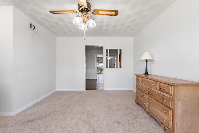 4331 Kolloch Dr, Dallas, TX 75216 - bedroom with a ceiling fan, light carpet, baseboards, and visible vents