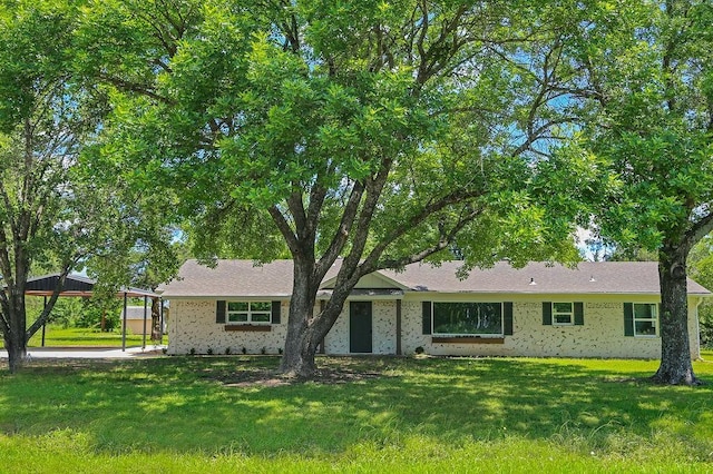 3815 Jefferson Rd, Paris, TX 75462 - single story home with a front yard and a detached carport