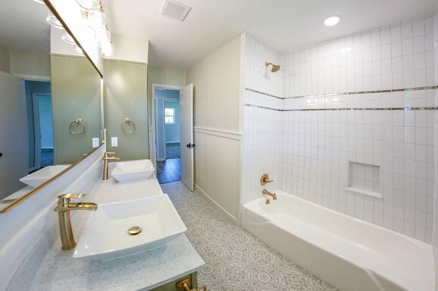 3815 Jefferson Rd, Paris, TX 75462 - full bathroom with shower / washtub combination, double vanity, and recessed lighting