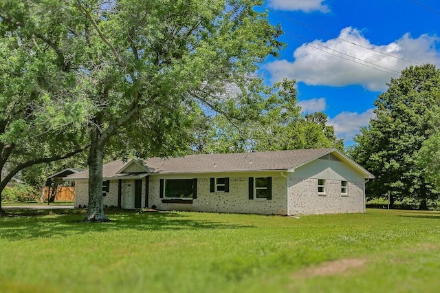 3815 Jefferson Rd, Paris, TX 75462 - ranch-style house featuring a front yard and brick siding