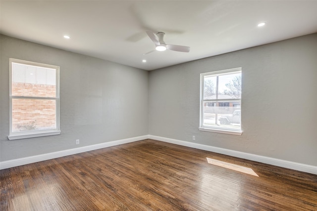 unfurnished room featuring baseboards, dark wood-style flooring, recessed lighting, and a ceiling fan