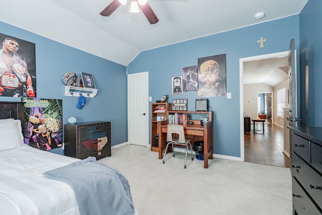796 Ridge Rd W, Rockwall, TX 75087 - carpeted bedroom featuring vaulted ceiling, a desk, baseboards, and ceiling fan