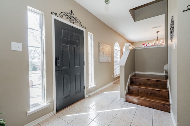 796 Ridge Rd W, Rockwall, TX 75087 - entryway with stairway, a chandelier, and light tile patterned floors