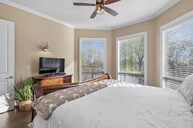 181 Monarch Dr, Denison, TX 75020 - bedroom with crown molding, wood finished floors, and a ceiling fan