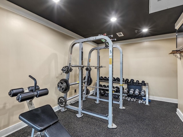 workout area featuring baseboards, visible vents, and recessed lighting