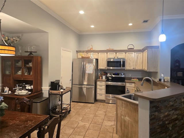 714 Green Acres Ln, Midlothian, TX 76065 - kitchen with appliances with stainless steel finishes, a sink, crown molding, light tile patterned floors, and a peninsula