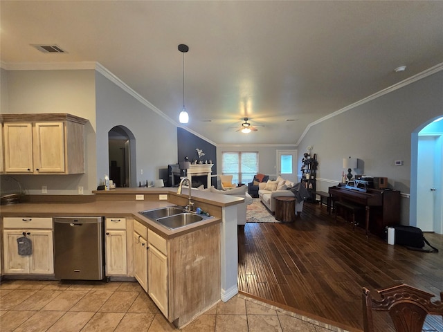 714 Green Acres Ln, Midlothian, TX 76065 - kitchen featuring dishwasher, a sink, arched walkways, open floor plan, and crown molding