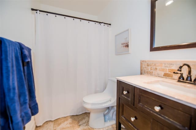 bathroom with curtained shower, toilet, vanity, tile patterned floors, and decorative backsplash