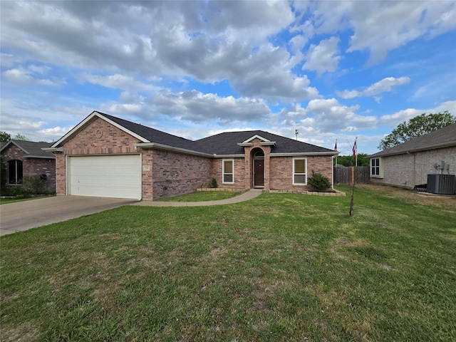 ranch-style house featuring fence, a front lawn, brick siding, a garage, and driveway