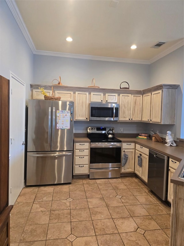 kitchen featuring light tile patterned floors, visible vents, ornamental molding, dark countertops, and stainless steel appliances