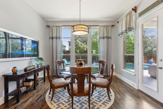 3960 Briar Tree Ln, Frisco, TX 75034 - dining room with dark wood-style flooring and baseboards