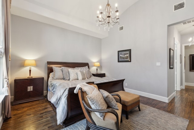 3960 Briar Tree Ln, Frisco, TX 75034 - bedroom with a chandelier, dark wood-style flooring, baseboards, and a high ceiling