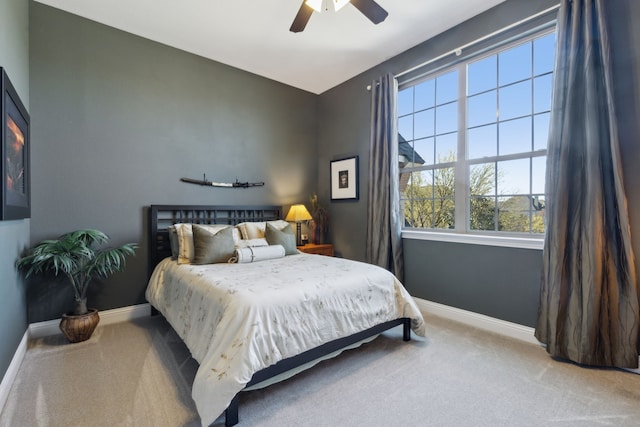 3960 Briar Tree Ln, Frisco, TX 75034 - carpeted bedroom featuring baseboards and a ceiling fan