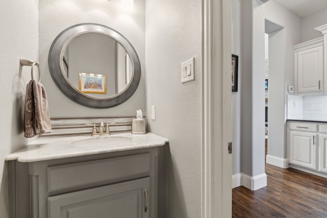 3960 Briar Tree Ln, Frisco, TX 75034 - bathroom featuring wood finished floors, vanity, and baseboards