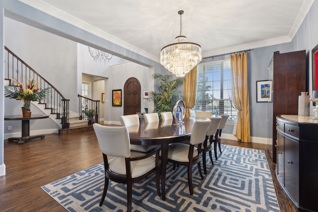 3960 Briar Tree Ln, Frisco, TX 75034 - dining room with a chandelier, stairway, dark wood-type flooring, crown molding, and baseboards