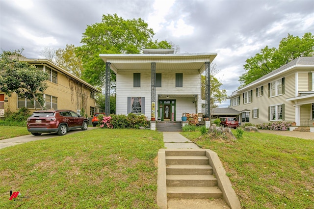 view of front property with a front lawn
