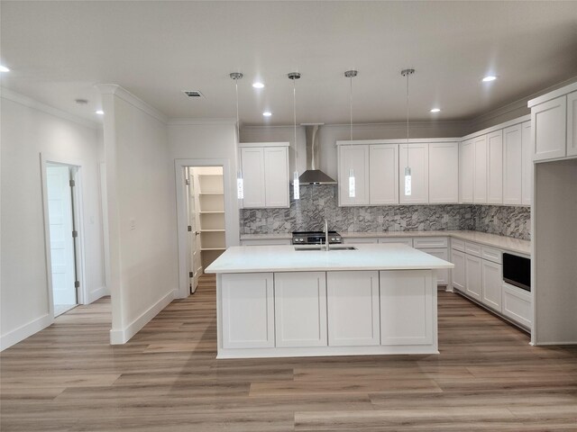 144 Shawnee Trl, Pottsboro, TX 75076 - kitchen with a sink, decorative backsplash, wall chimney exhaust hood, ornamental molding, and visible vents