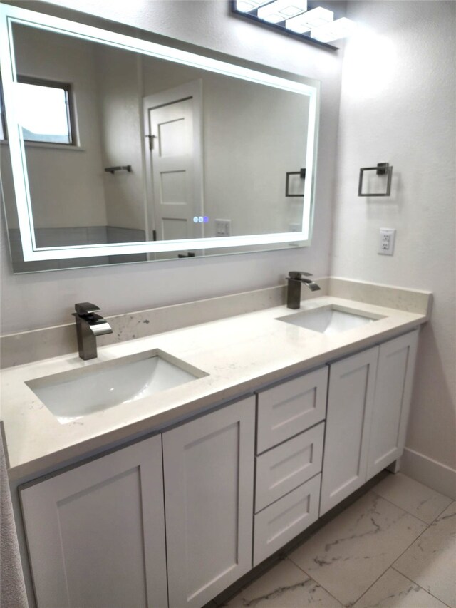 144 Shawnee Trl, Pottsboro, TX 75076 - bathroom featuring marble finish floor, a sink, and double vanity