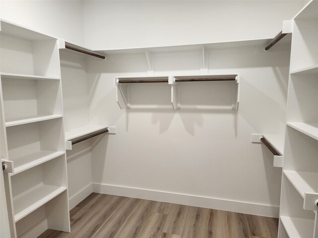 144 Shawnee Trl, Pottsboro, TX 75076 - walk in closet featuring light wood-style flooring