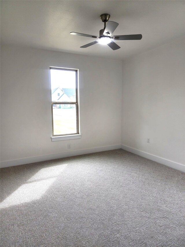 144 Shawnee Trl, Pottsboro, TX 75076 - empty room with baseboards, a ceiling fan, and carpet flooring