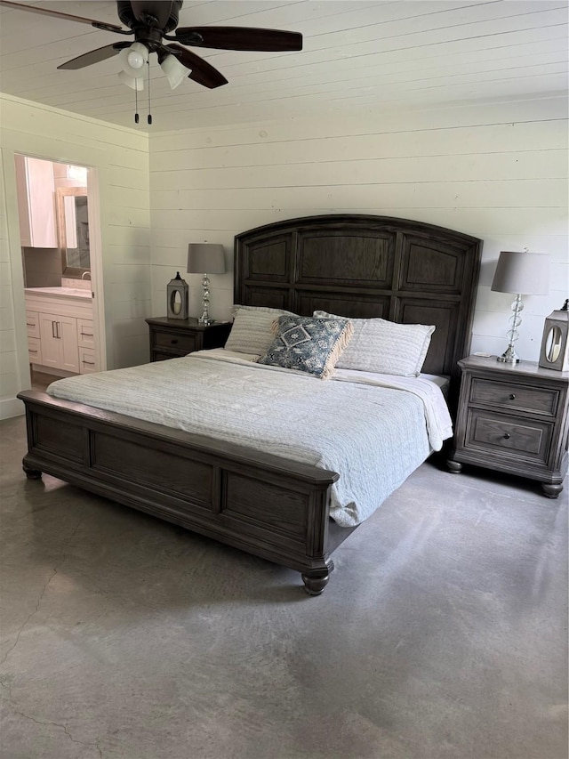 bedroom with connected bathroom and ceiling fan