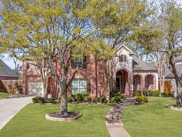 3117 Robert Dr, Richardson, TX 75082 - view of front of home featuring an attached garage, fence, brick siding, and concrete driveway