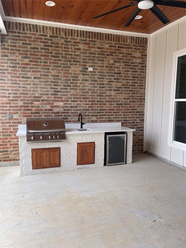 637 Caledonia Dr, Bossier City, LA 71111 - view of patio / terrace featuring a ceiling fan, a grill, a sink, beverage cooler, and an outdoor kitchen