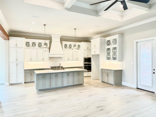 637 Caledonia Dr, Bossier City, LA 71111 - kitchen featuring light wood-style flooring, stainless steel appliances, gray cabinets, and premium range hood