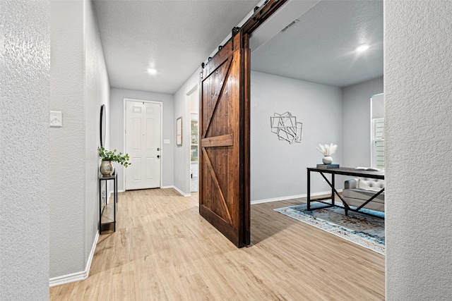 9173 Blackstone Dr, Providence Village, TX 76227 - unfurnished living room with light wood finished floors, ceiling fan, and baseboards