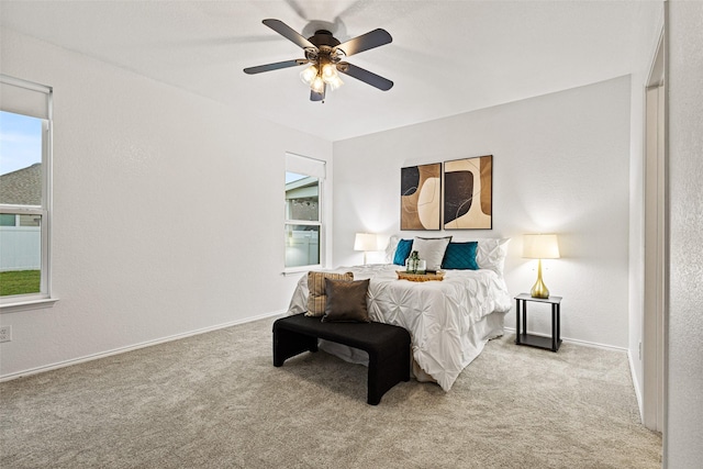 9173 Blackstone Dr, Providence Village, TX 76227 - carpeted bedroom featuring baseboards and ceiling fan