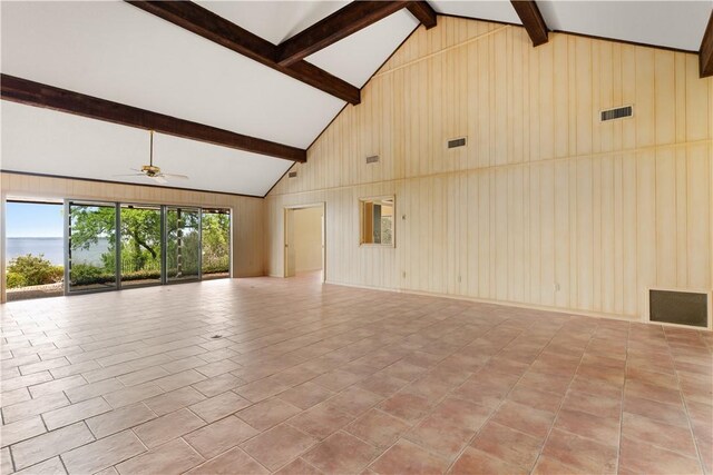 3709 Windmill Hill St, Waco, TX 76710 - unfurnished living room featuring light tile patterned flooring, high vaulted ceiling, beam ceiling, visible vents, and ceiling fan