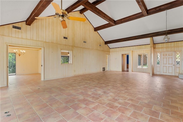 3709 Windmill Hill St, Waco, TX 76710 - unfurnished living room with ceiling fan with notable chandelier, visible vents, tile patterned flooring, and lofted ceiling with beams