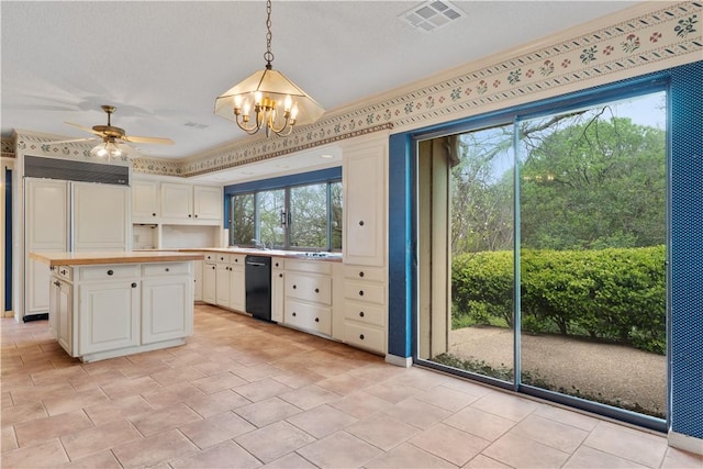 3709 Windmill Hill St, Waco, TX 76710 - kitchen with white cabinets, black dishwasher, hanging light fixtures, and visible vents