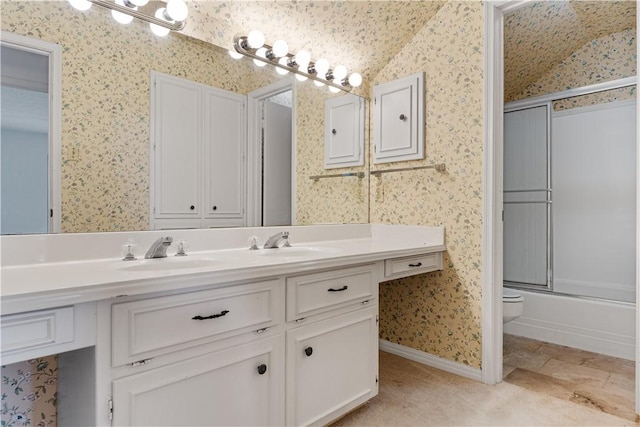 3709 Windmill Hill St, Waco, TX 76710 - bathroom featuring a sink, wallpapered walls, and toilet