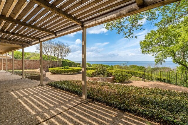3709 Windmill Hill St, Waco, TX 76710 - view of patio with a water view, fence, and a pergola