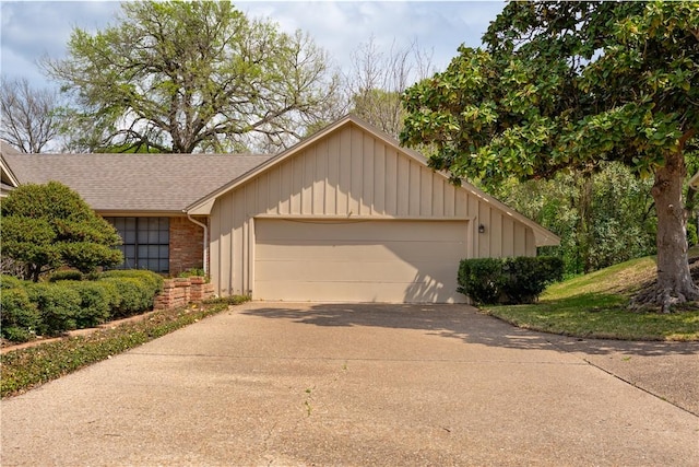 3709 Windmill Hill St, Waco, TX 76710 - view of front facade with driveway, a garage, brick siding, and roof with shingles
