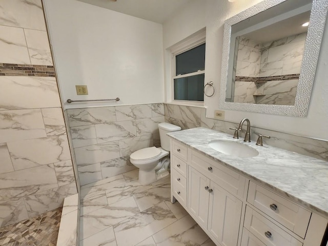 bathroom featuring tile walls, walk in shower, marble finish floor, toilet, and vanity